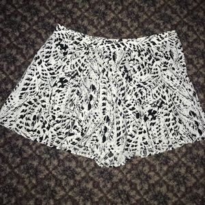 White and black shorts. Very flows